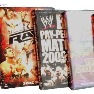 WWE Wrestling DVD lot of 4 , plus a bonus Unopened XCW Total Destruction DVD's